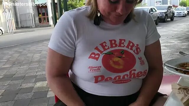 Tattooed MILF pisses on busy street while slutty bitch receives pierced