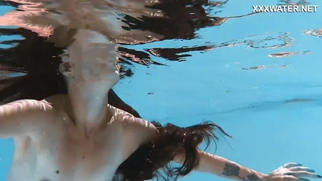 Sweet petite Hungarian babe Lana enjoys a swim