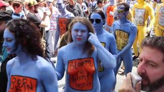 Blindsided by bare breasts on busy boulevards