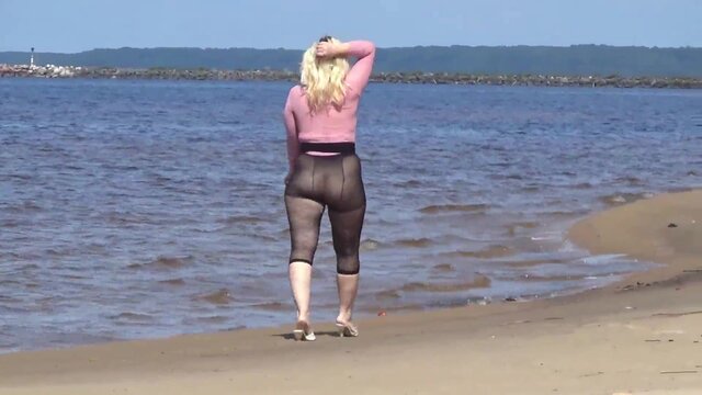 Funny MATURE BABE sucks and shows off enormous breasts at the beach