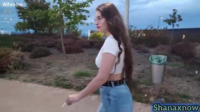 Brunette hottie with a giant booty shows off her round backside in clenching jeans