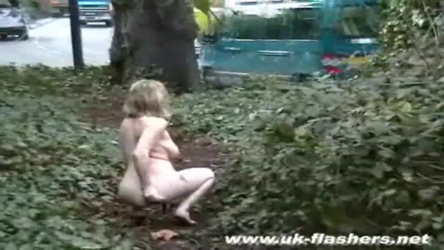 Amateur babe Yala shows her tiny tits and bare pussy in the English countryside