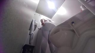 Steamy solo session in a hospital stall, cam-girl style